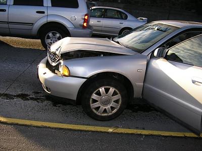 Parting Out my totaled A4 worthwhile???-side-view-front-damage.jpg