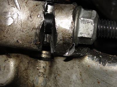 Torn CV Boot Wooes-drivers-side-close-up.jpg