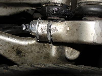 Torn CV Boot Wooes-passenger-side.jpg