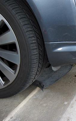 How-to: 2004 A8 Oil Change Procedure-img_1889_a8_raised_on_garage_lip.jpg