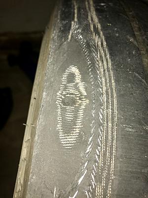Strange tire damage - Any guesses?-3.jpg