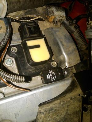 broken part under the rats nest on valve cover-auditt002.jpg