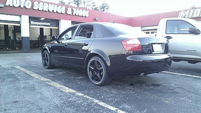 Anyone have a black B6 on stock wheels painted black???-blk-wheels-back.jpg