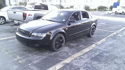 Anyone have a black B6 on stock wheels painted black???-blk-wheels-front.jpg