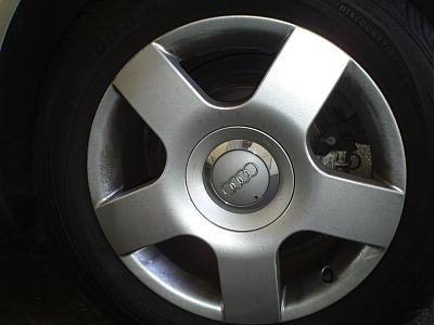 How do I remove the rims' center cap?-audi-parts-019.jpg