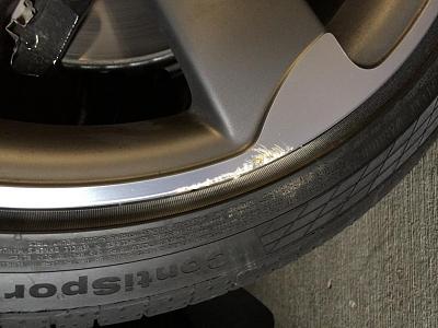 Curb rash - Can I buff it myself?-img_1054.jpg