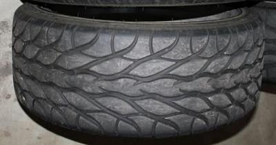 Severe tire wear at the track-leftrear_small.jpg